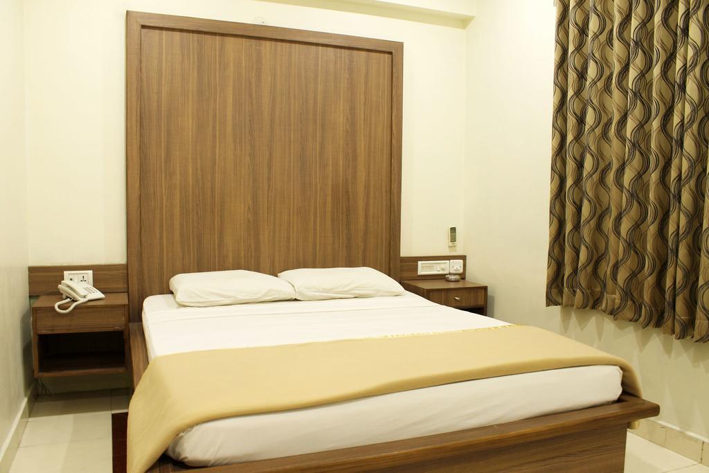 Hotel Stay Inn Bangalore Quarto foto