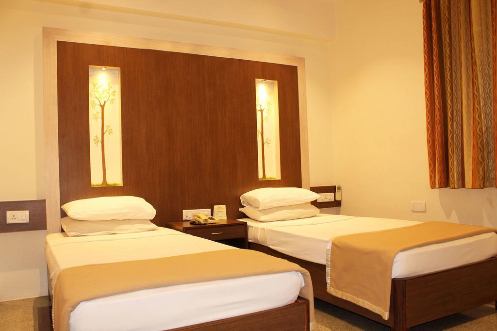 Hotel Stay Inn Bangalore Quarto foto